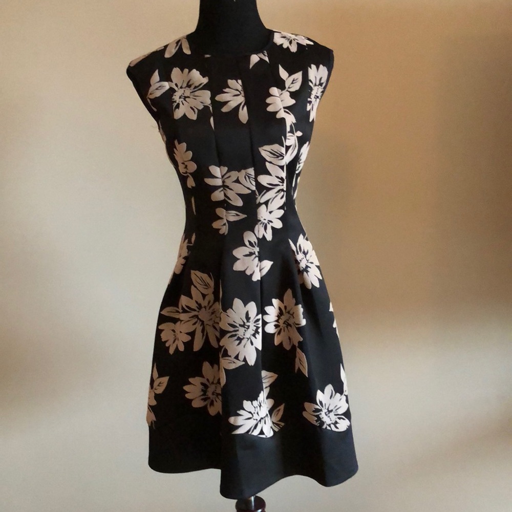 Black dress with tan flower appliqués